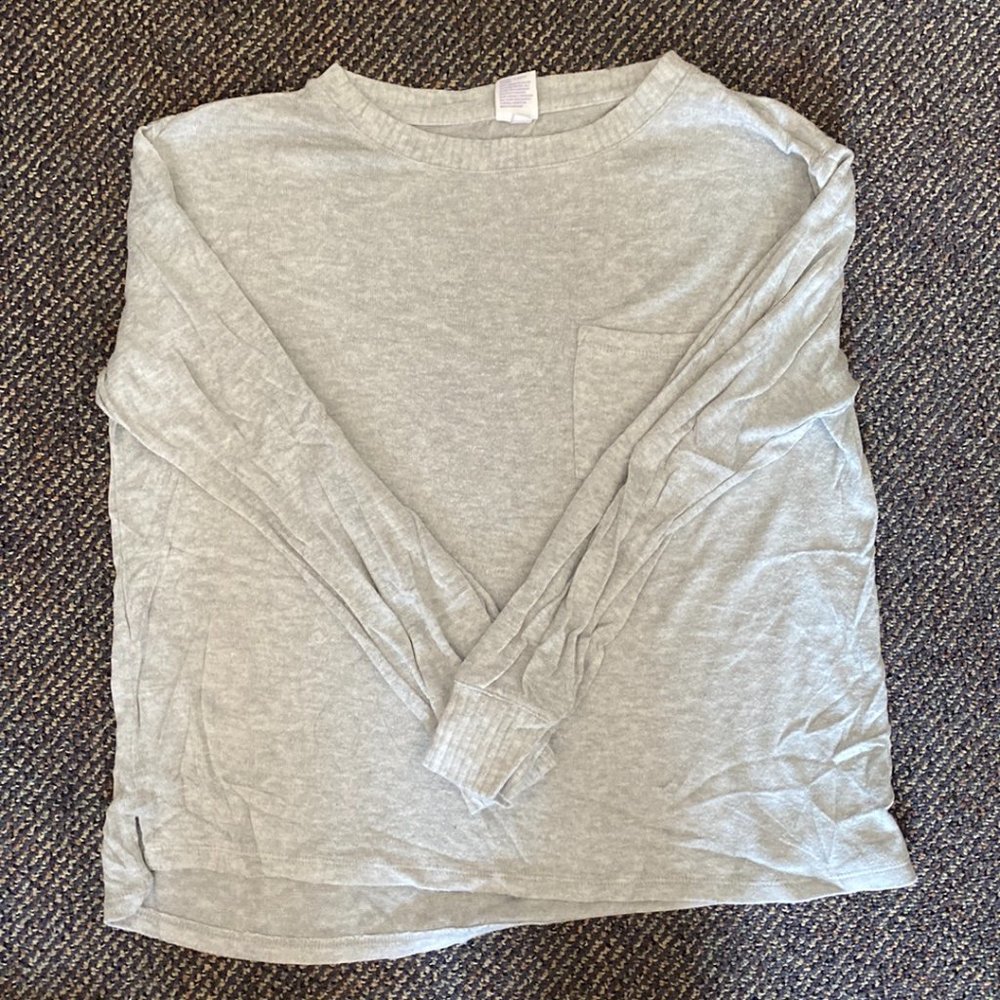 Grey matching pajama/lounge set. Size M top, L bottoms.